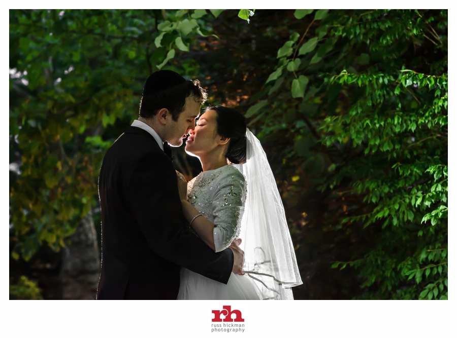 A couple kiss after their Orthodox Jewish Wedding in Philadelphia.